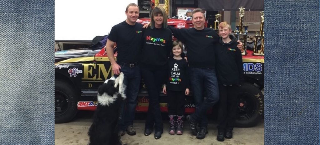 Johnson family with race-truck
